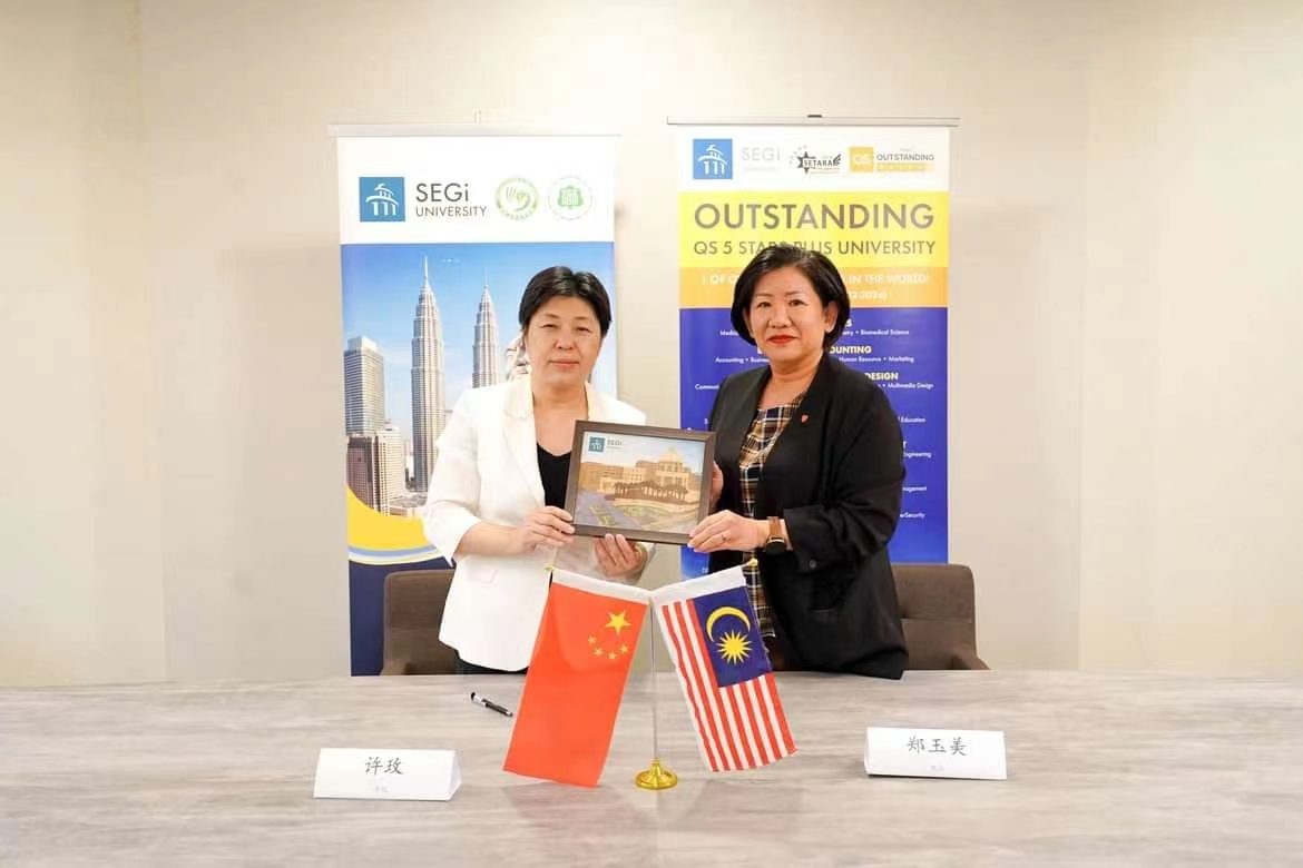 许玫率团赴马来西亚世纪大学访问交流